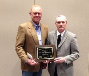 Dr. Tom Troxel (right) accepts the Southern Section Distinguished Service Award from Dr. Monte Rouquette